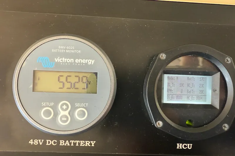 Landfall Yacht Photos Pics Battery monitor display on 2013 Greenline 33, showing 55.29V and additional metrics.
