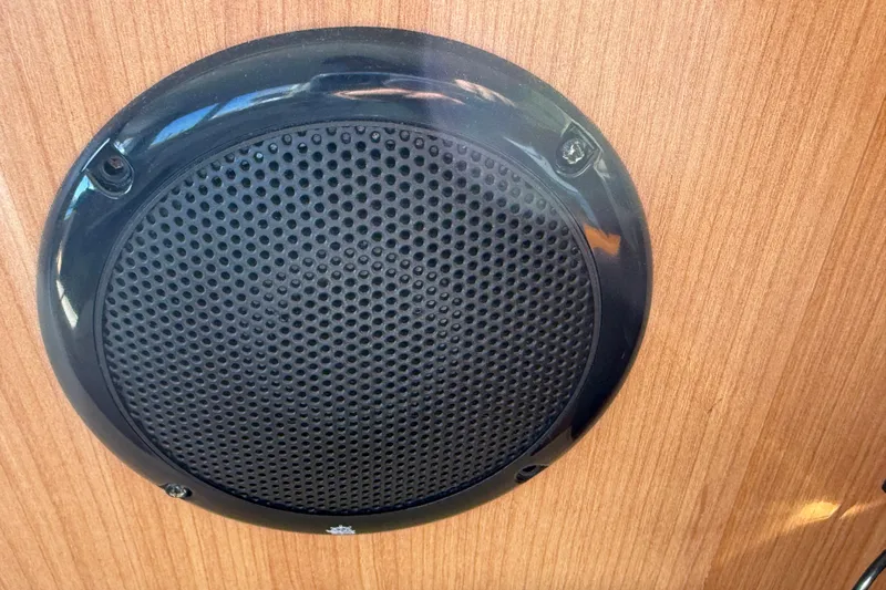 Landfall Yacht Photos Pics Black speaker mounted on wood panel in 2013 Greenline 33 boat.