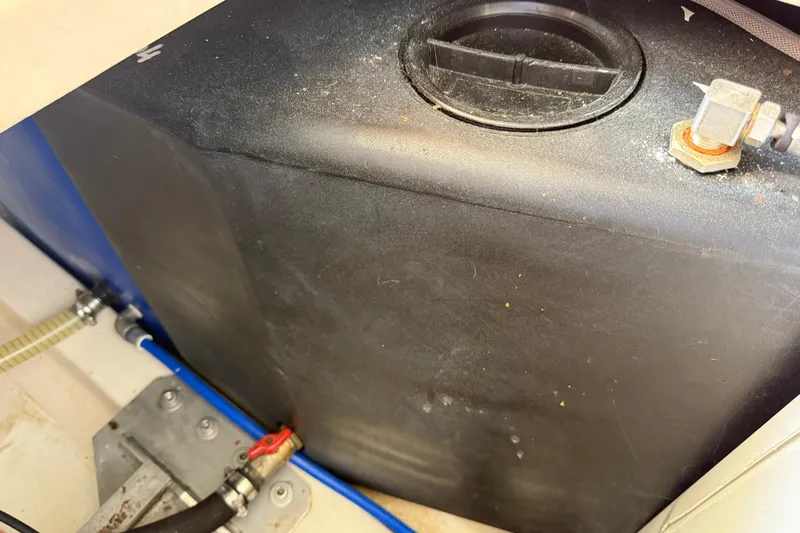 Landfall Yacht Photos Pics Fuel tank of a 2013 Greenline 33 boat, showing connections and fittings.