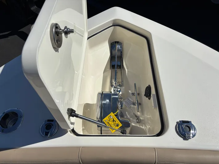  Yacht Photos Pics 2025 Scout 260 LXF anchor compartment with open hatch and visible hardware.