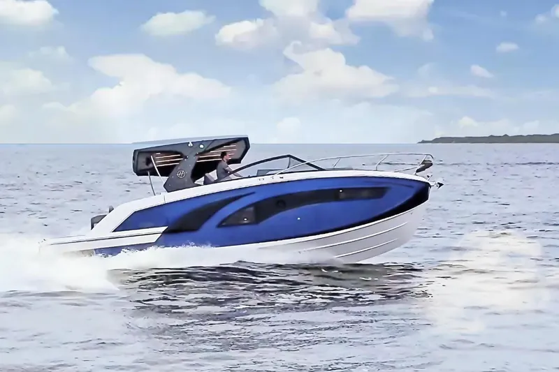 Custom Order Your 347 Today! Yacht Photos Pics 2025 Hanover 347 Inboard boat cruising on open water under a clear blue sky.