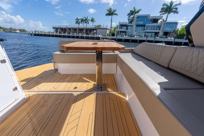 Custom Order Your 347 Today! Yacht Photos Pics Luxurious Hanover 347 boat interior with wooden deck and seating, 2026 model.
