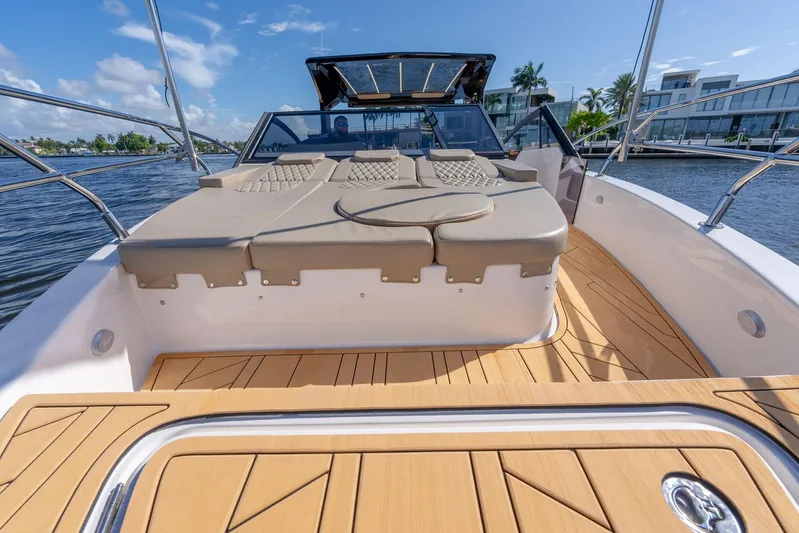Custom Order Your 347 Today! Yacht Photos Pics Luxurious 2026 Hanover 347 boat with spacious sun deck and modern design on a sunny day.