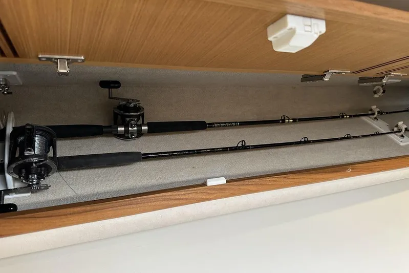 Moving Violation Yacht Photos Pics Fishing rods stored in a 2008 Cabo 40 boat compartment.
