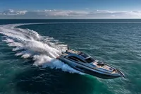 Luxurious 2020 Pershing 8X yacht cruising swiftly on open ocean waters.