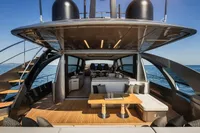 Luxurious 2020 Pershing 8X yacht interior with modern seating and ocean view.