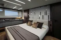Luxurious bedroom interior of 2020 Pershing 8X yacht with modern design and ocean view.