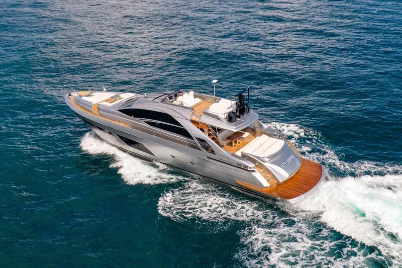 Alexandra Yacht Photos Pics Luxurious 2020 Pershing 8X yacht cruising on open sea, showcasing sleek design and elegance.