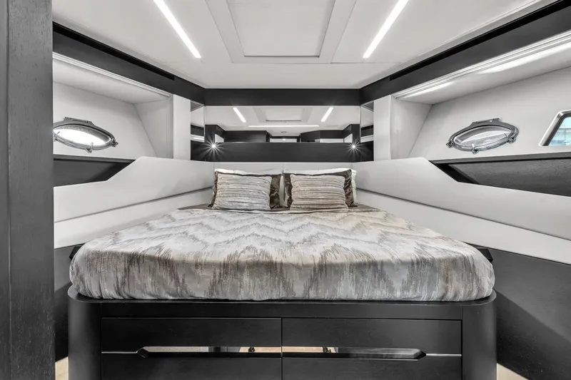 Alexandra Yacht Photos Pics Luxurious bedroom interior of 2020 Pershing 8X yacht with modern design and elegant bedding.