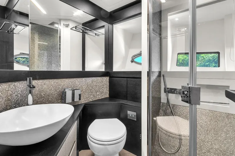 Alexandra Yacht Photos Pics Luxurious bathroom in 2020 Pershing 8X yacht with modern fixtures and elegant design.