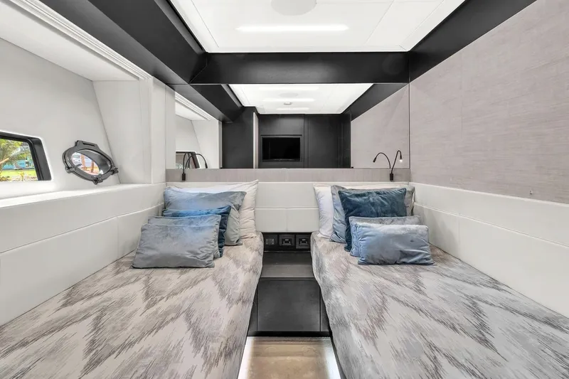 Alexandra Yacht Photos Pics Luxurious 2020 Pershing 8X yacht interior with twin beds and elegant decor.