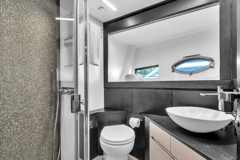 Alexandra Yacht Photos Pics Luxurious bathroom in 2020 Pershing 8X yacht with modern fixtures and elegant design.