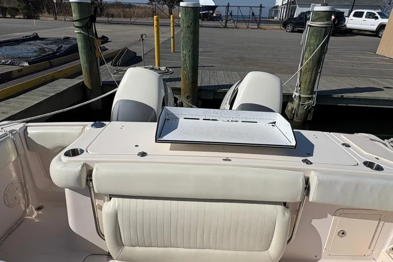  Yacht Photos Pics 2008 Grady-White Canyon 336 boat docked, featuring a Magma grill on the deck.