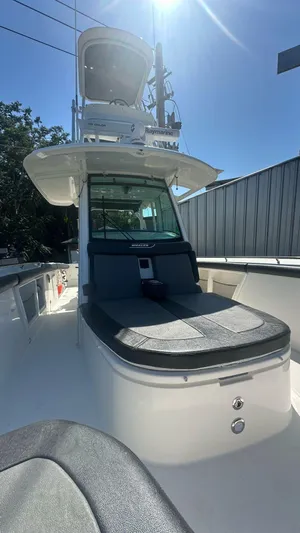  Yacht Photos Pics 2014 Boston Whaler 350 Outrage boat with sleek design and spacious seating.