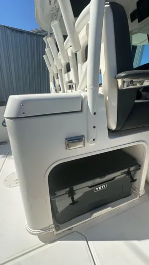  Yacht Photos Pics 2014 Boston Whaler 350 Outrage interior with Yeti cooler storage.