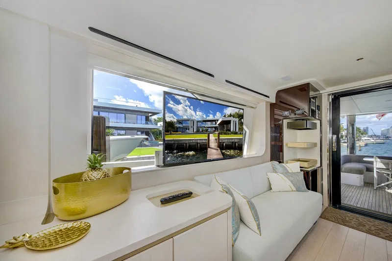 Transcendence Yacht Photos Pics Luxurious interior of 2020 Azimut 78 Flybridge yacht with modern decor and waterfront view.