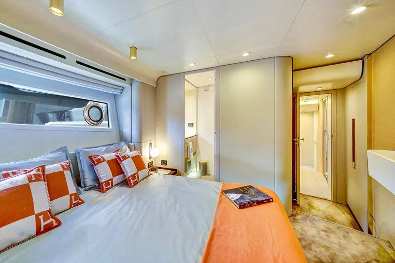 Transcendence Yacht Photos Pics Luxurious bedroom interior of 2020 Azimut 78 Flybridge yacht with elegant decor and cozy ambiance.
