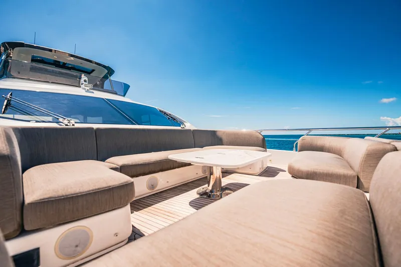 Transcendence Yacht Photos Pics Luxurious 2020 Azimut 78 Flybridge yacht with spacious outdoor seating and ocean view.