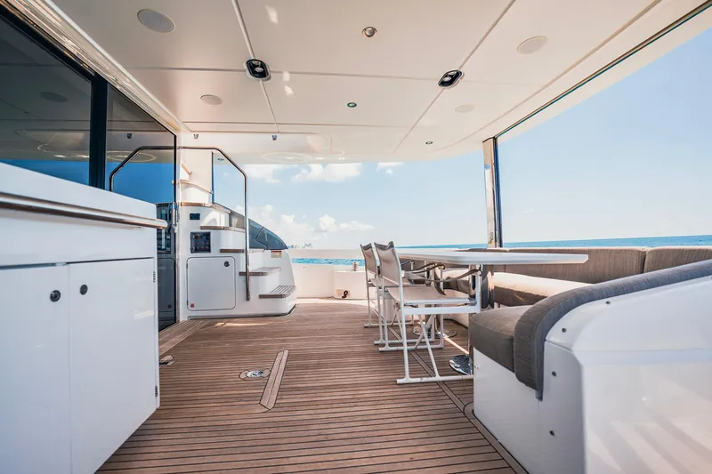 Transcendence Yacht Photos Pics Azimut 78 Flybridge 2020 yacht deck with seating and ocean view.