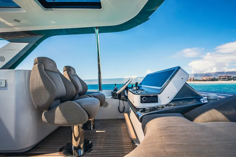 Transcendence Yacht Photos Pics Flybridge of 2020 Azimut 78 yacht with modern helm and ocean view.