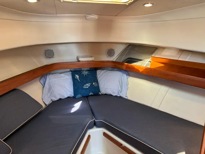 Bay Cruzin Yacht Photos Pics 2004 Mainship Pilot 34 Rum Runner II cabin with cozy V-berth and cushions.