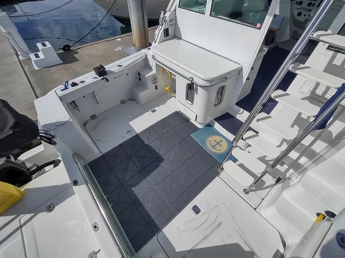 Ocelot Yacht Photos Pics 2005 Glacier Bay 3490 Ocean Runner boat interior with deck and seating area.