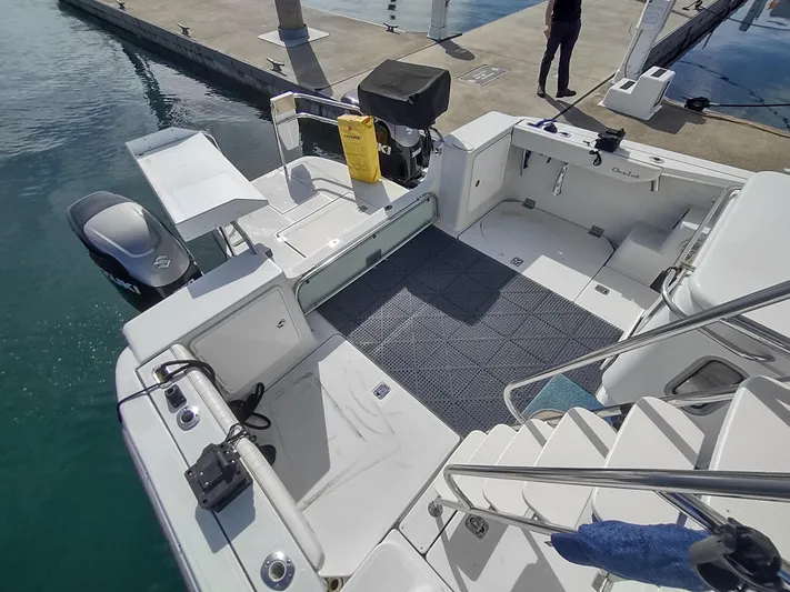 Ocelot Yacht Photos Pics 2005 Glacier Bay 3490 Ocean Runner boat docked, featuring spacious deck and modern amenities.