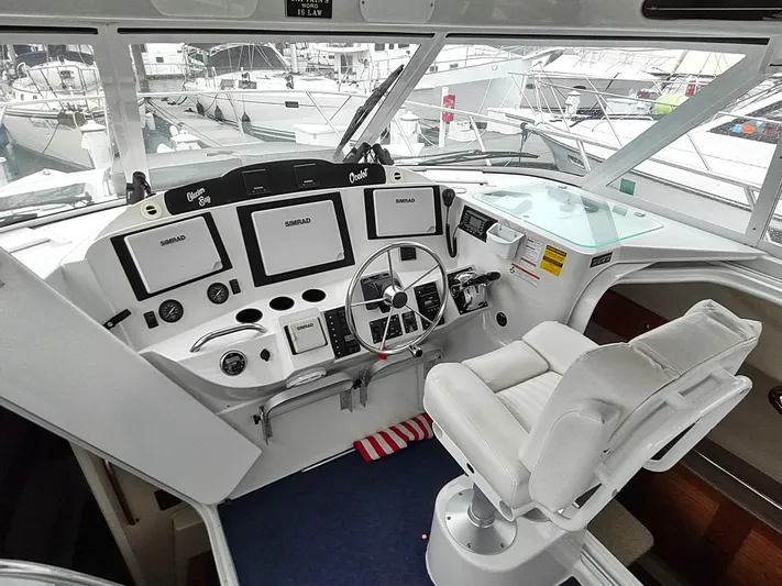 Ocelot Yacht Photos Pics Helm of 2005 Glacier Bay 3490 Ocean Runner with modern navigation equipment.