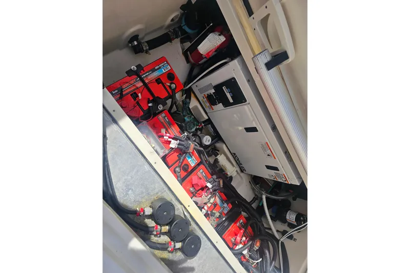 Day For It Yacht Photos Pics 2018 Boston Whaler 315 Conquest engine compartment with batteries and generator.
