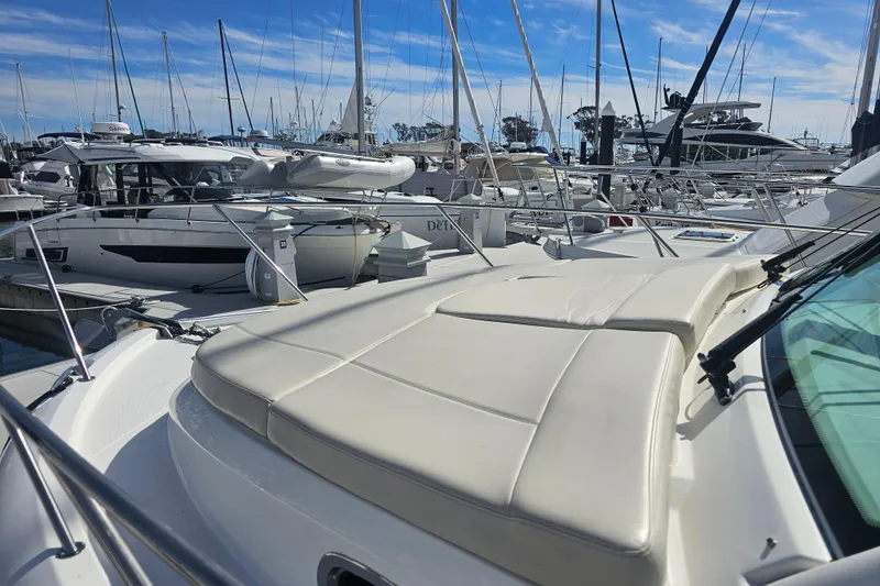 Day For It Yacht Photos Pics 2018 Boston Whaler 315 Conquest docked at marina with other boats.