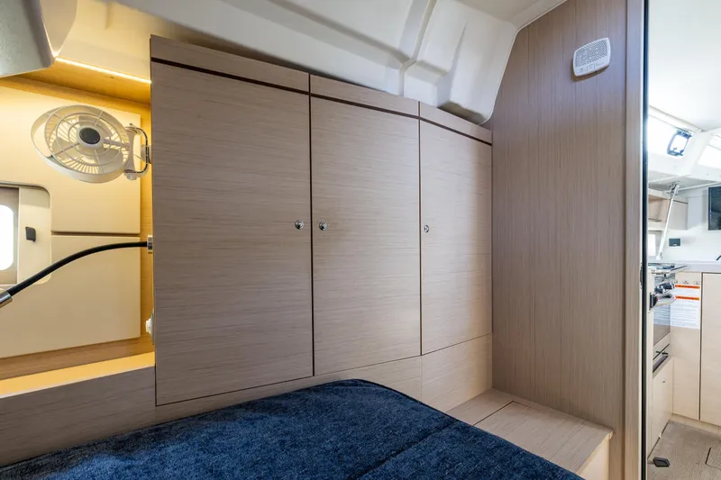 Cypress And Star II Yacht Photos Pics Interior of 2020 Beneteau Oceanis 46.1 yacht, featuring sleek wood cabinetry and modern design.