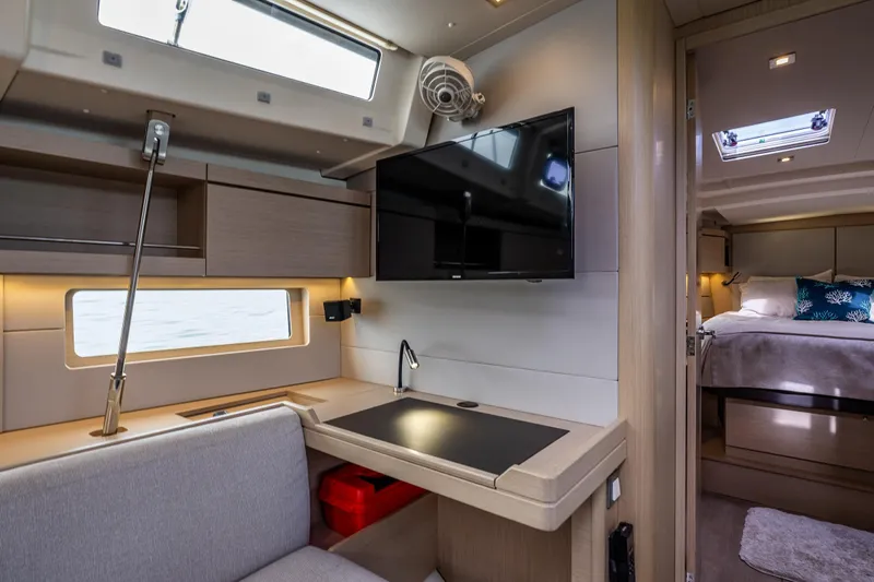 Cypress And Star II Yacht Photos Pics Interior of 2020 Beneteau Oceanis 46.1 yacht with modern furnishings and a cozy bedroom.