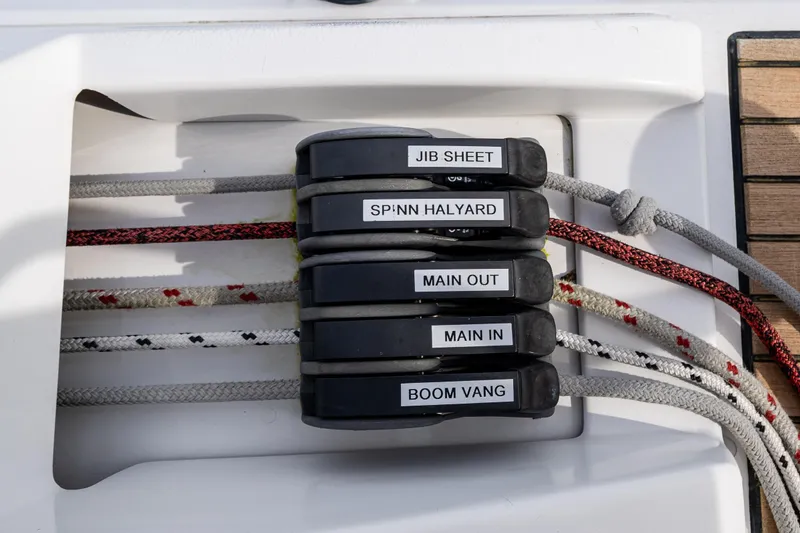 Cypress And Star II Yacht Photos Pics Control lines on a 2020 Beneteau Oceanis 46.1 sailboat, labeled for easy identification.