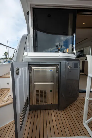  Yacht Photos Pics Azimut Fly 53 yacht 2022, featuring a sleek outdoor kitchenette with stainless steel appliances.