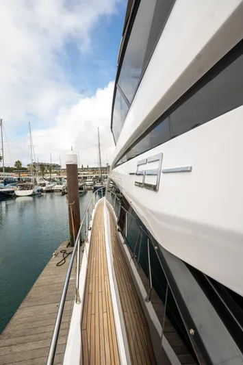  Yacht Photos Pics 2022 Azimut Fly 53 yacht docked at marina, showcasing sleek design and luxury features.