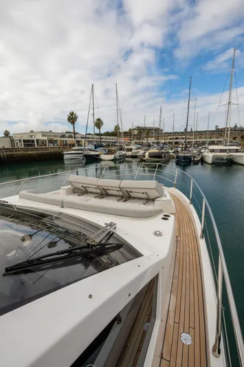  Yacht Photos Pics Azimut Fly 53 yacht, 2022 model, docked in a marina with clear skies.