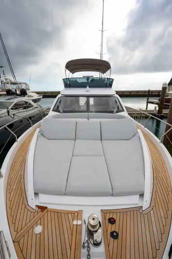 Yacht Photos Pics Azimut Fly 53 yacht, 2022 model, featuring sleek design and spacious deck under cloudy skies.