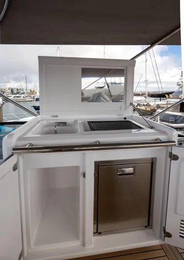 Yacht Photos Pics Outdoor kitchen on 2022 Azimut Fly 53 yacht with grill and storage.