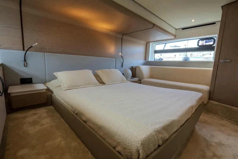  Yacht Photos Pics Luxurious bedroom interior of 2022 Azimut Fly 53 yacht with modern design.