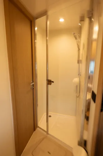  Yacht Photos Pics Shower area in 2022 Azimut Fly 53 yacht, featuring modern glass enclosure and sleek design.