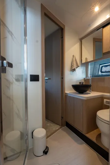  Yacht Photos Pics Modern bathroom interior on 2022 Azimut Fly 53 yacht, featuring sleek design and amenities.