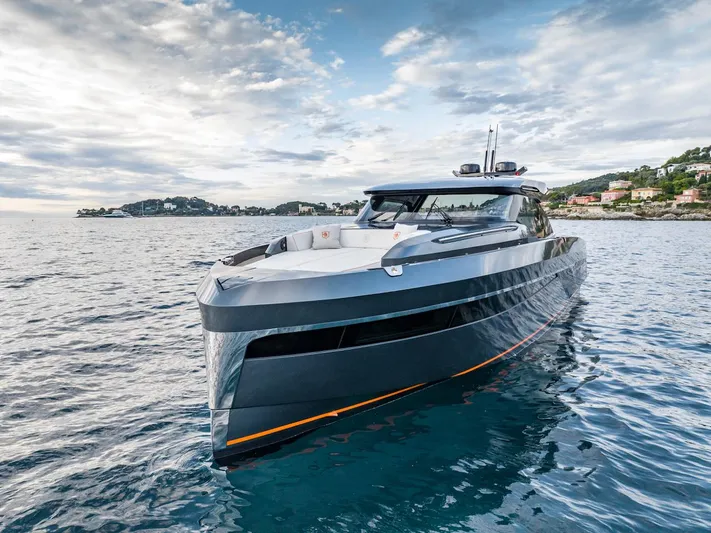  Yacht Photos Pics Luxurious 2023 Bekkers Yachts Azur 45HT cruising on serene waters under a cloudy sky.