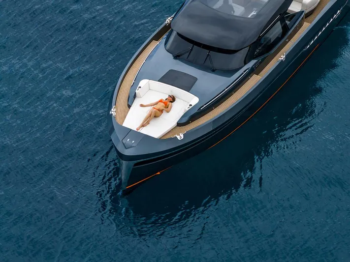  Yacht Photos Pics 2023 Bekkers Yachts Azur 45HT on water, person sunbathing on deck.
