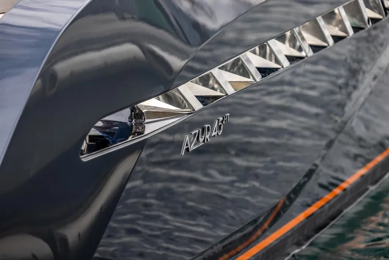  Yacht Photos Pics 2023 Bekkers Yachts Azur 45HT, sleek design with chrome accents on the water.