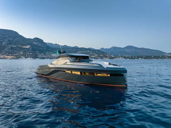  Yacht Photos Pics Luxurious 2023 Bekkers Yachts Azur 45HT cruising on serene waters with mountainous backdrop.