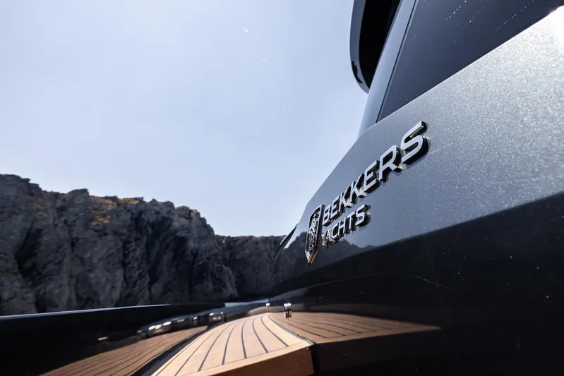  Yacht Photos Pics Bekkers Yachts Azur 45HT 2023, sleek design with scenic rocky backdrop.