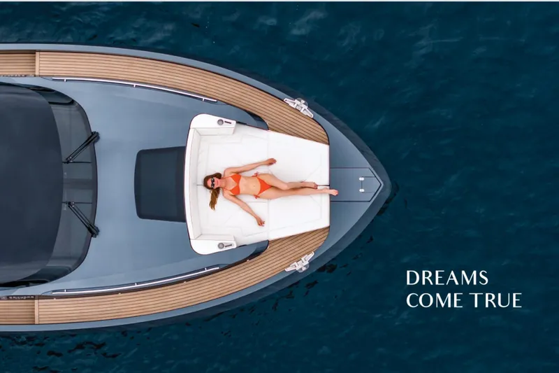  Yacht Photos Pics 2023 Bekkers Yachts Azur 45HT with sunbather, captioned "Dreams Come True."