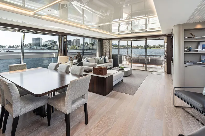 Don Tortuga Yacht Photos Pics Luxurious interior of 2024 Sunseeker 90 Ocean yacht with elegant dining and living area.