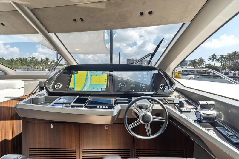 Don Tortuga Yacht Photos Pics Luxurious 2024 Sunseeker 90 Ocean yacht cockpit with advanced navigation system and sleek design.