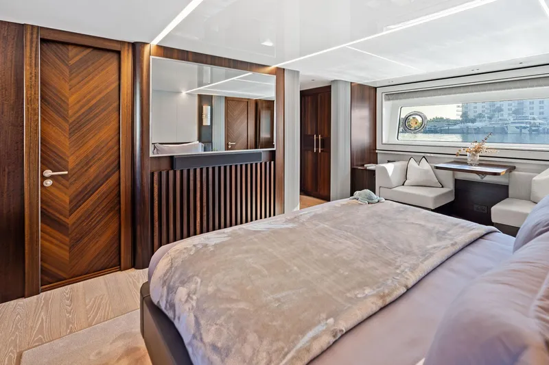 Don Tortuga Yacht Photos Pics Luxurious interior of 2024 Sunseeker 90 Ocean yacht with elegant wood finishes.